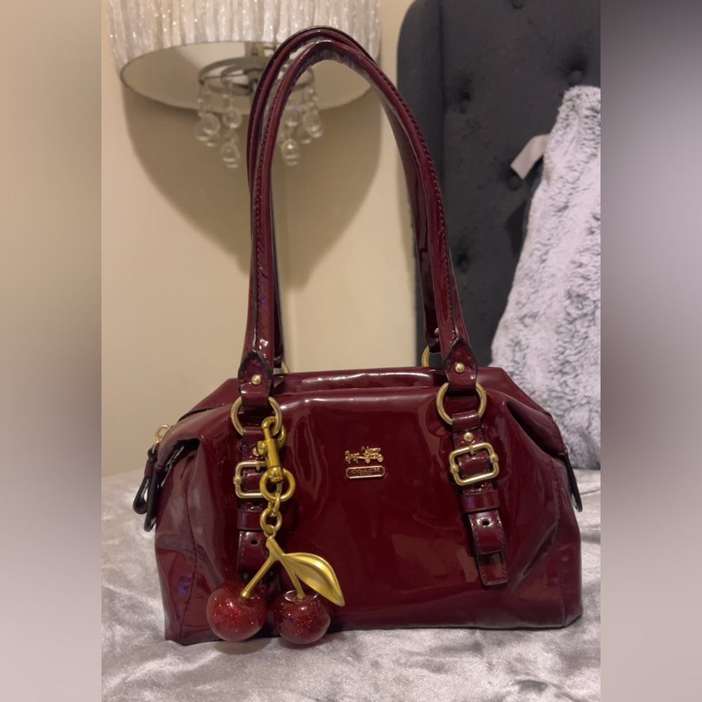 Coach Maroon Patent Leather Bag with Gold Accents